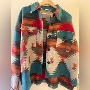Multiple color boho jacket. Distressed hemming. Worn twice, in great condition.
